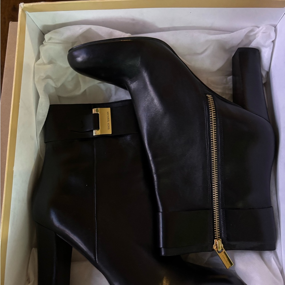 MICHAEL Michael Kors Black Leather Ankle Boots with Gold Accents